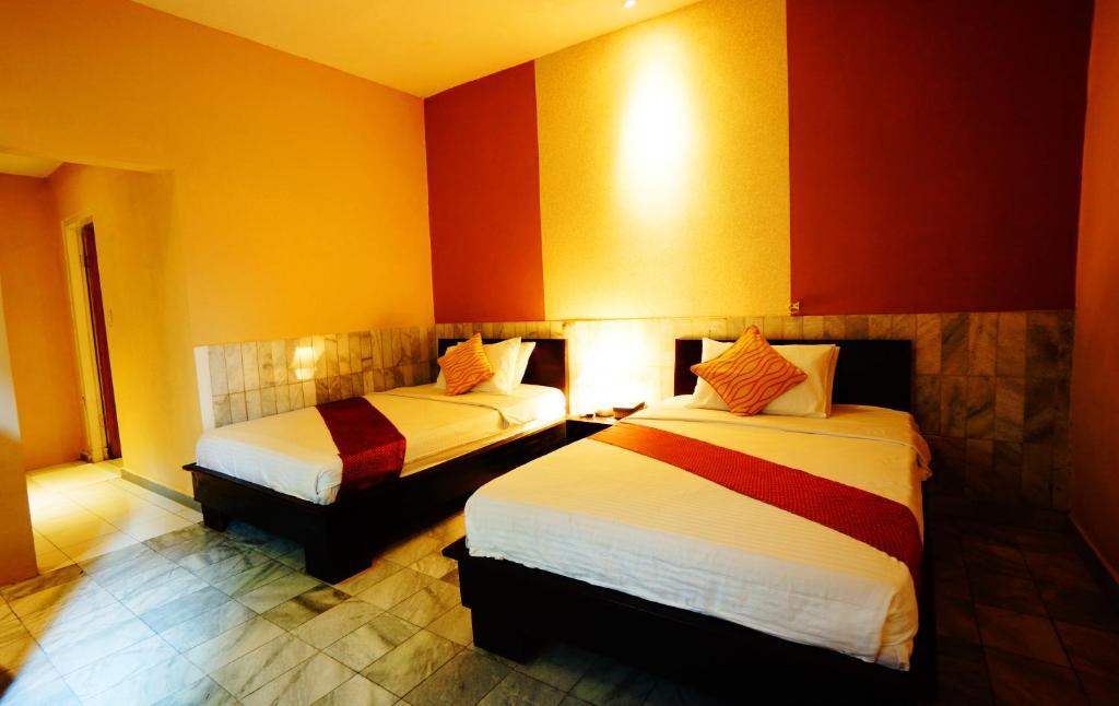 Puri Wisata Balinese Style Hotel Семиньяк Номер фото